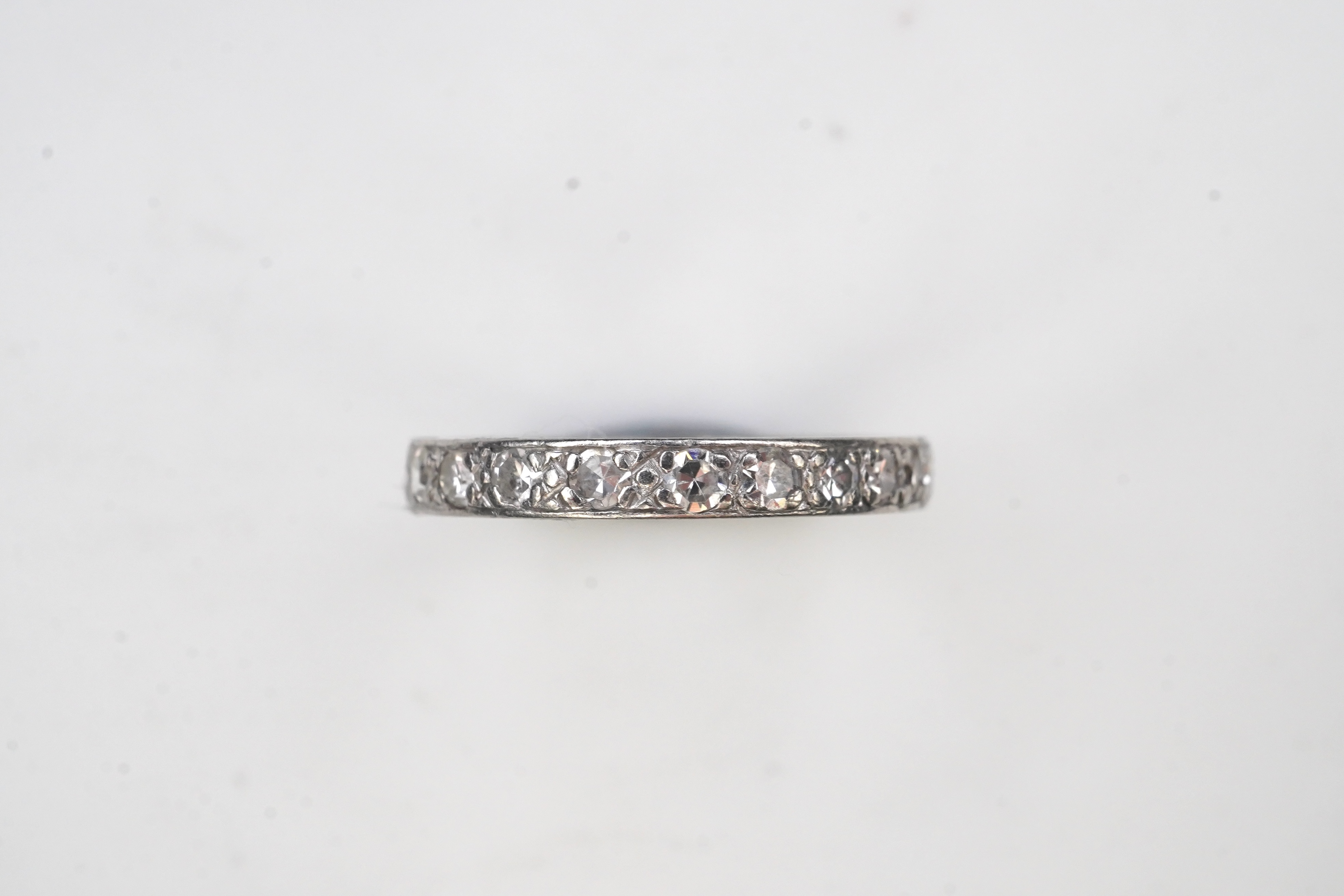 A diamond eternity ring, mid 20th century